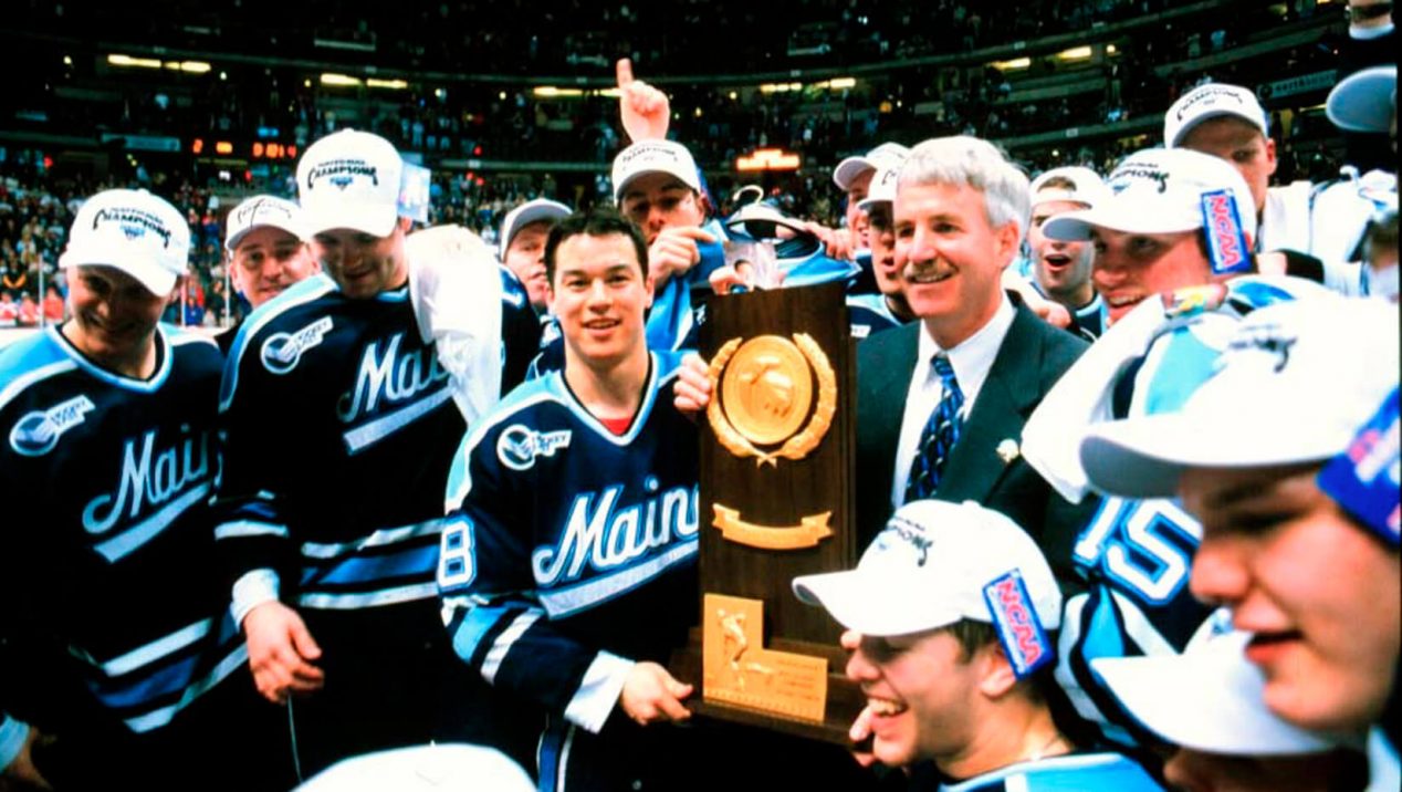 Men's ice hockey players celebrate their national championship win