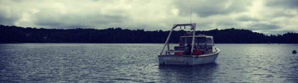 Oyster Girl boat on the water
