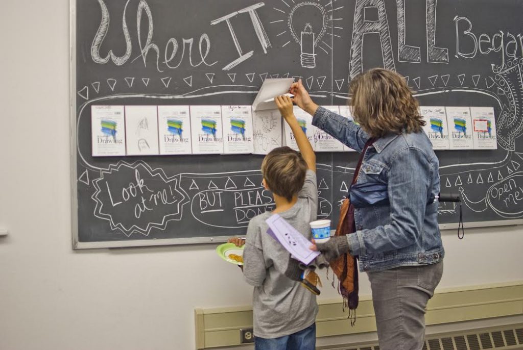 students by chalkboard