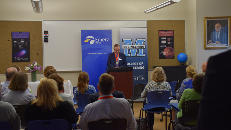 A photo of someone speaking at a podium