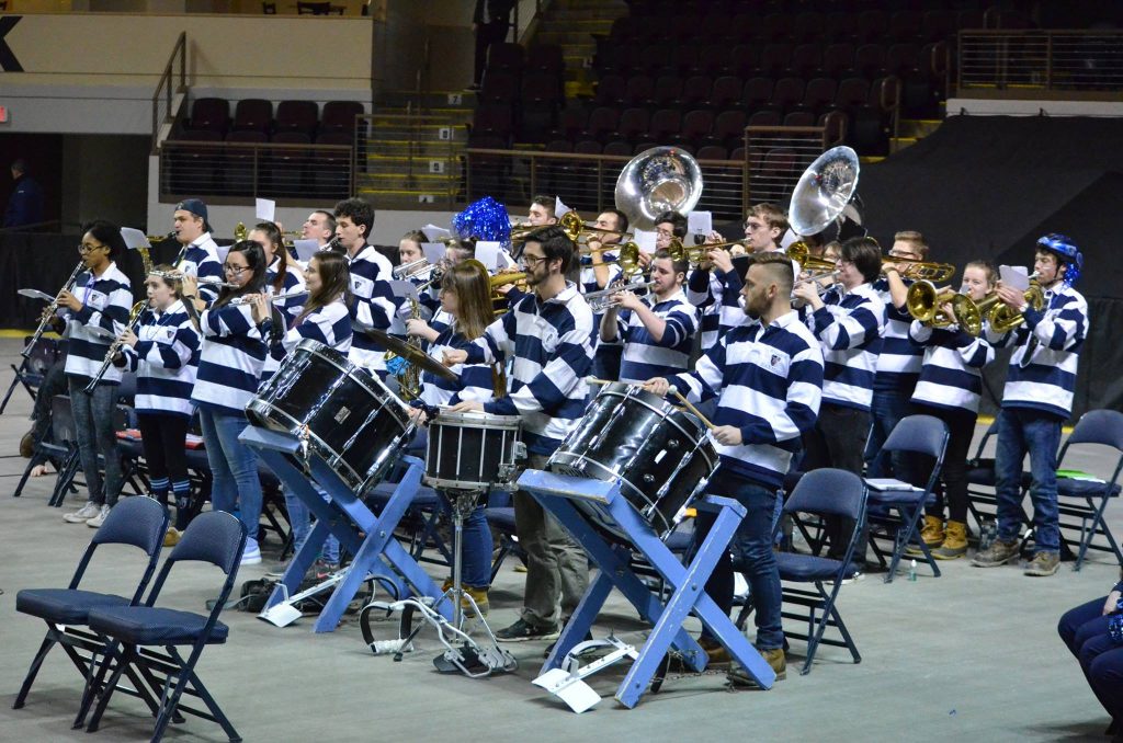 members of the pep band playing at cross insurance arena, portland