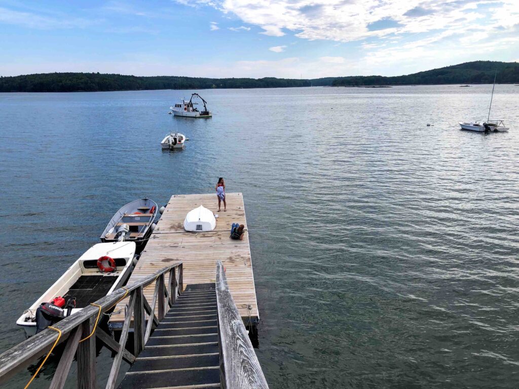 Student on dock in Lowes Cove