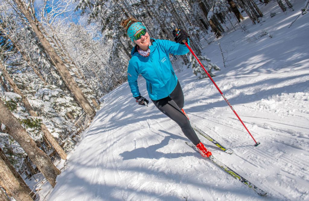A photo of a woman skiing