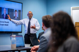 Dr. Muralee Das teaching a class