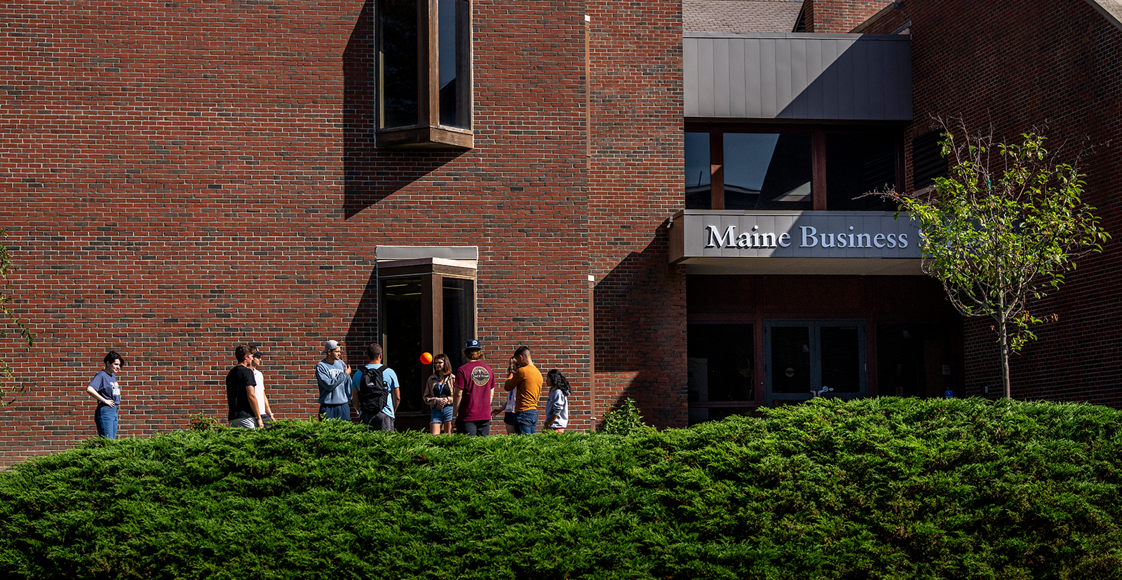 Students outside of the Donald P. Corbett Business Building