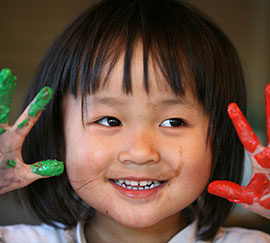 girl with finger paint