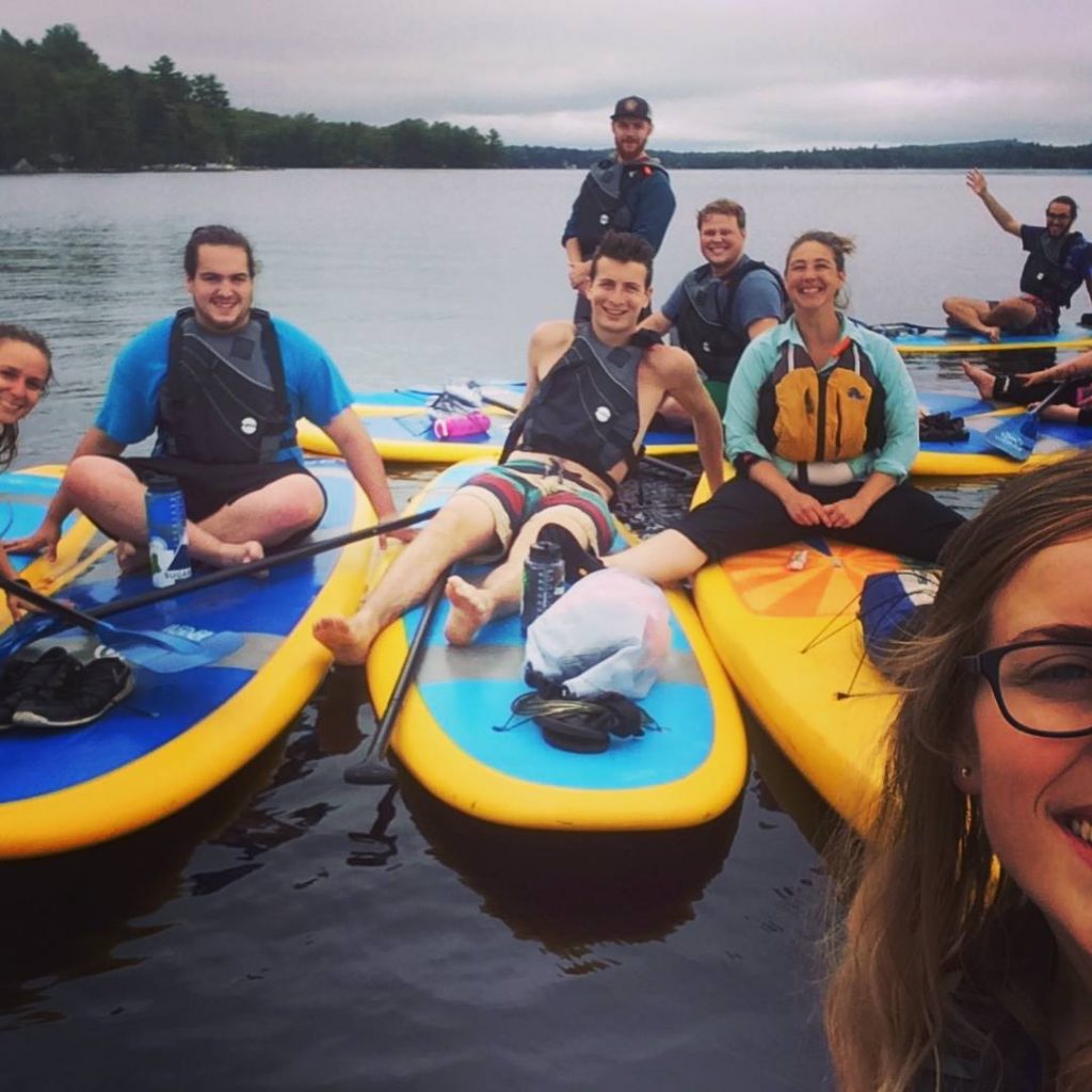 kayakers in a row