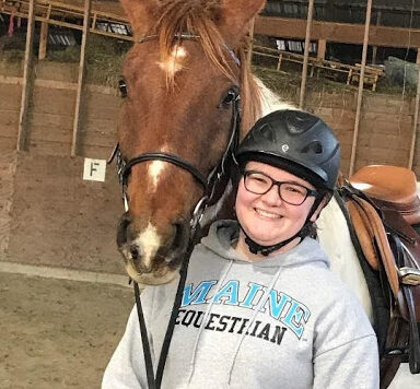 equestrian team member and horse