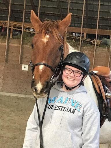 equestrian team member and horse