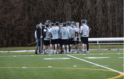 Lacrosse Team huddled