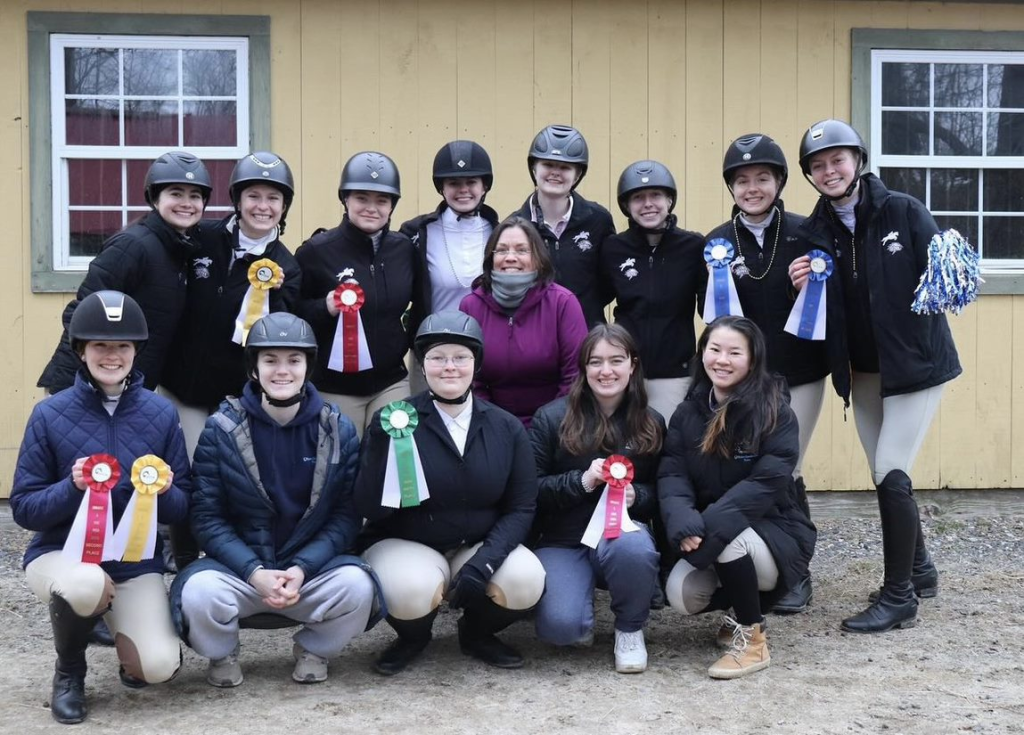 UMaine Equestrian team members gathered for a group photo.