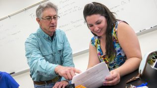 professor working with student