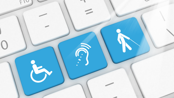An image of a white keyboard with three blue keys. Each with an image representing accessibility. From left to right: A wheelchair, an ear and a person with a walking cane.