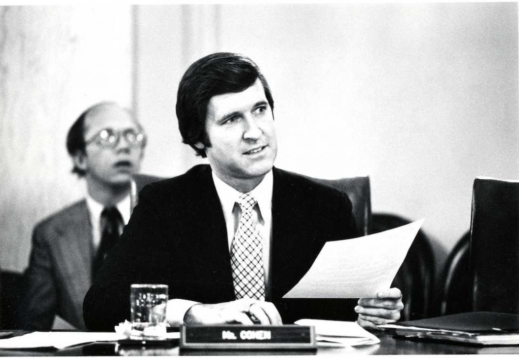 Historical photograph of Secretary Cohen at work