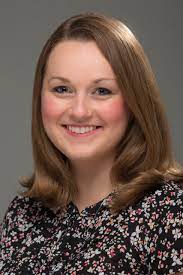 A professional photograph of Jennifer Desmond