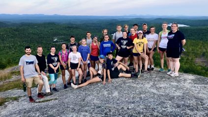 Group of HS students at the peak of a Maine mountain