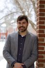 A professional photograph of Dr. Ryan LaRochelle outside on the UMaine campus.