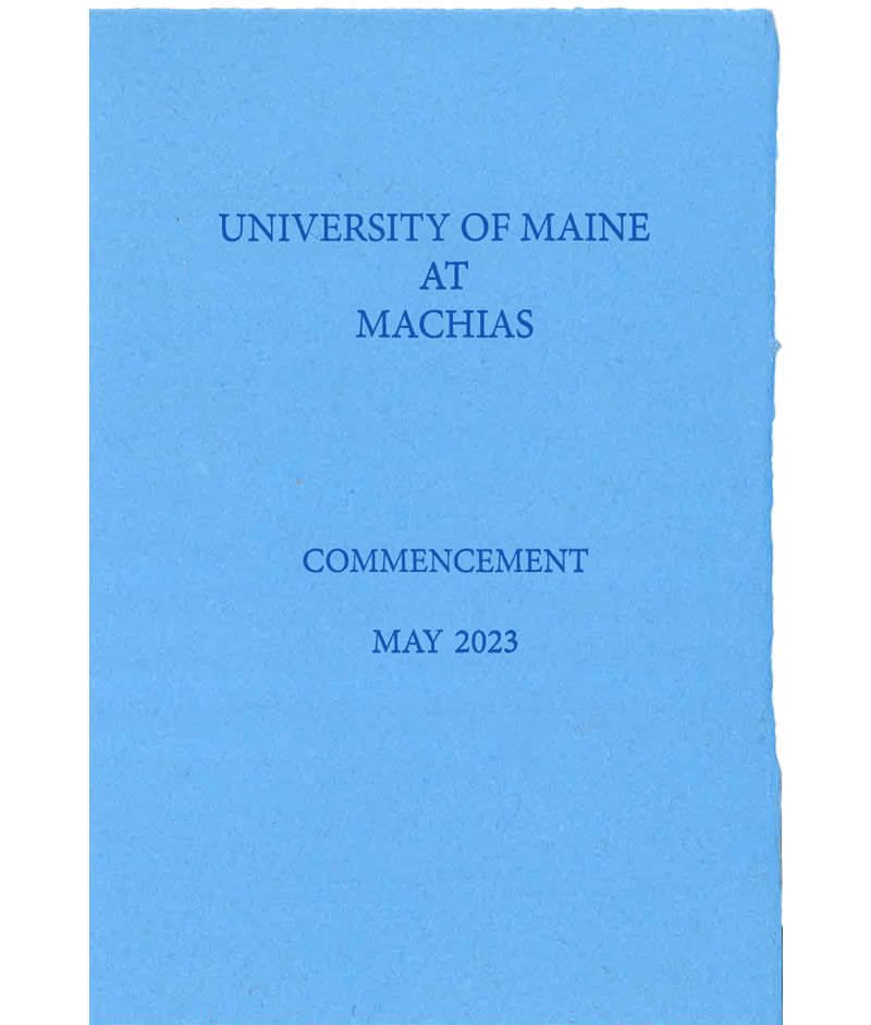 A photo of the cover of UMaine Machias Commencement Program
