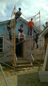 CET students working on Habitat for Humanity house renovation