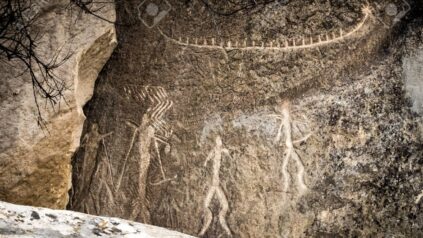 ancient rock carvings petroglyphs of people with boat in gobustan national park