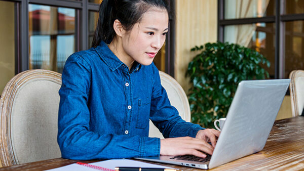 student working on laptop