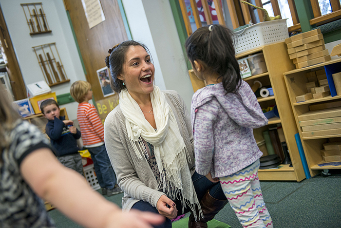 teacher in classroom with young children
