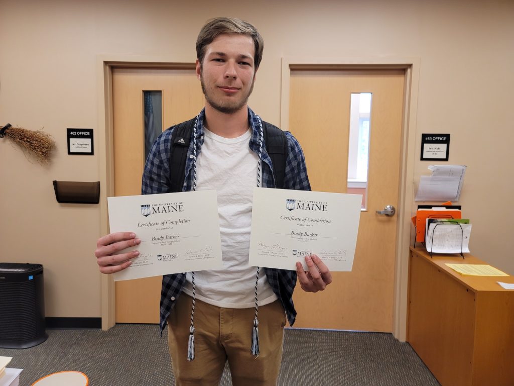 Student holds two UMaine Early College pathway certificates