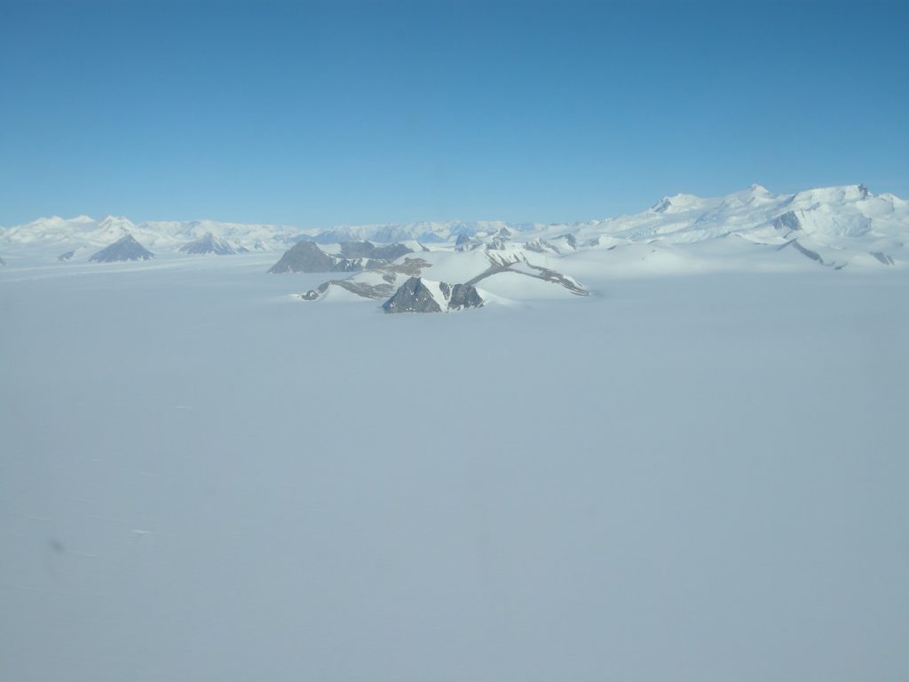 Overview of our field areas and the mouth of Amundsen Glacier meeting the Ross Ice Shelf. The central Nunatak is Witalis Peak, just behind this (and across a smaller side glacier) is Robinson Bluff. They are ~10 km apart.