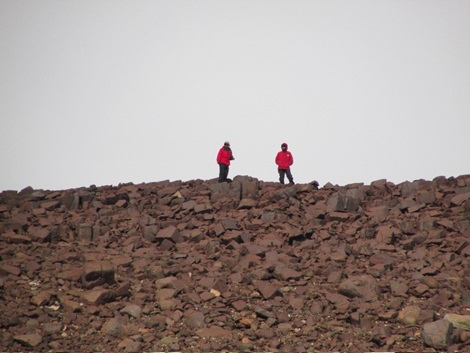 Figure 9: Dr. John Stone and graduate student, Trevor Hillebrand, hiking a ridge in search of a drift limit to collect rock samples from for cosmogenic nuclide dating. 