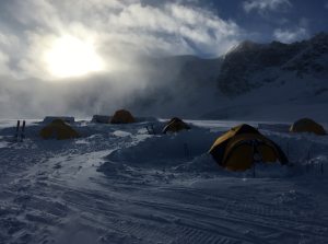 tents with snow walls around them