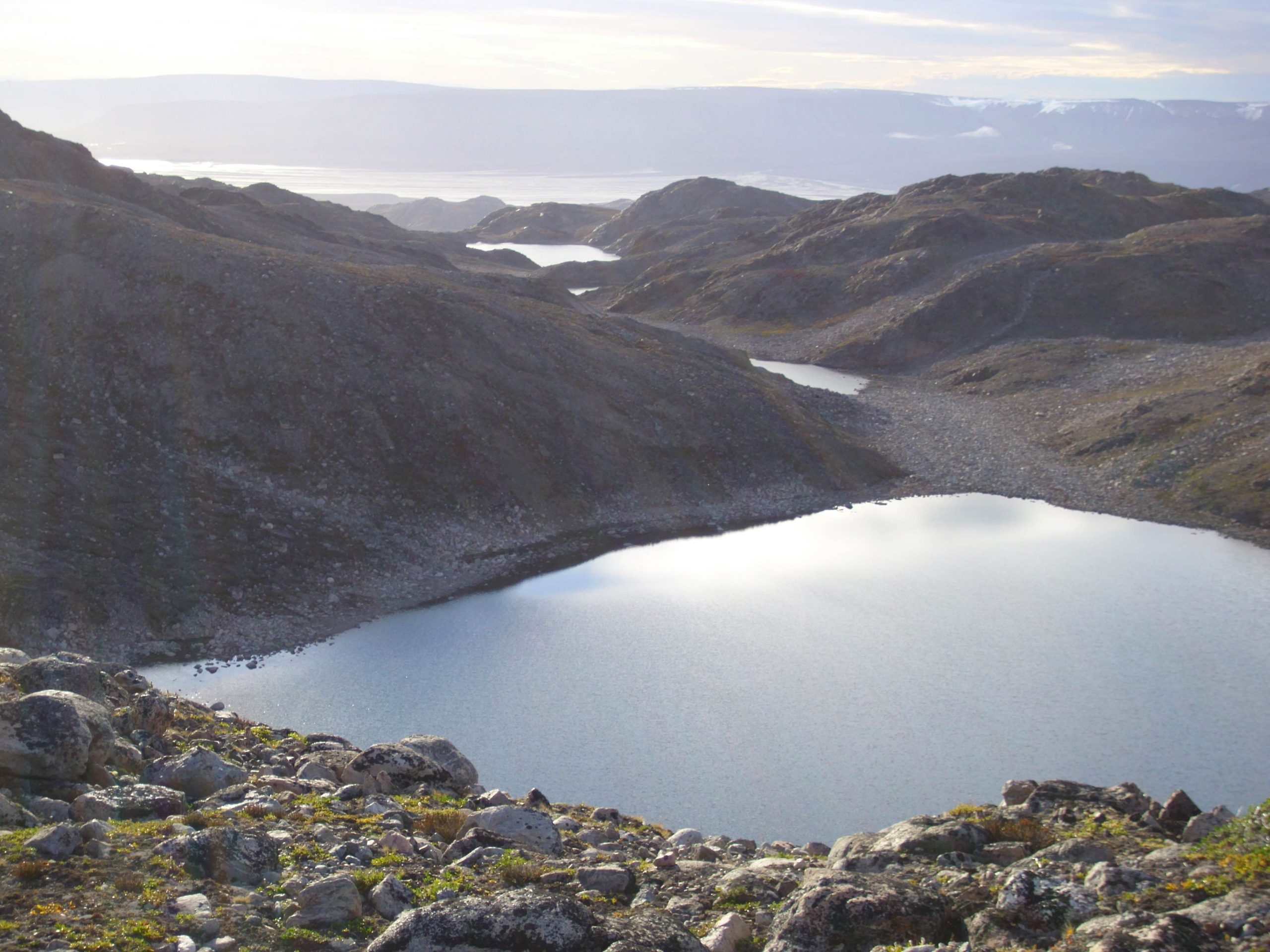 Looking west towards a series of lakes in Liverpool Land, East Greenland. Photo credit: Amanda Lusas.
