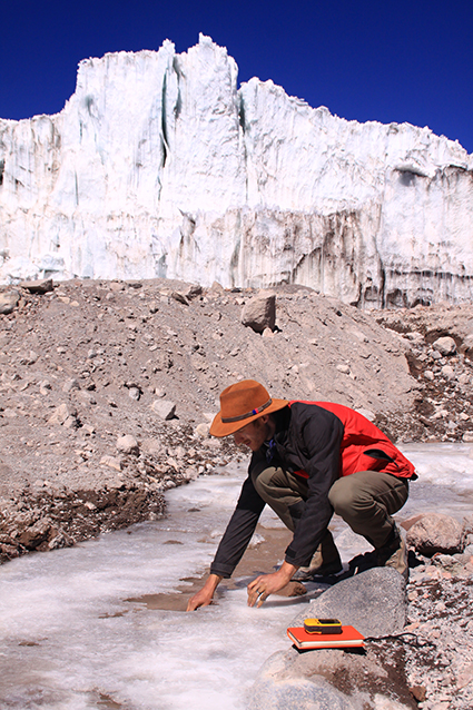 Gordon Bromley sampling meltwater at Nevado Coropuna. Photo credit: Gordon Bromley.
