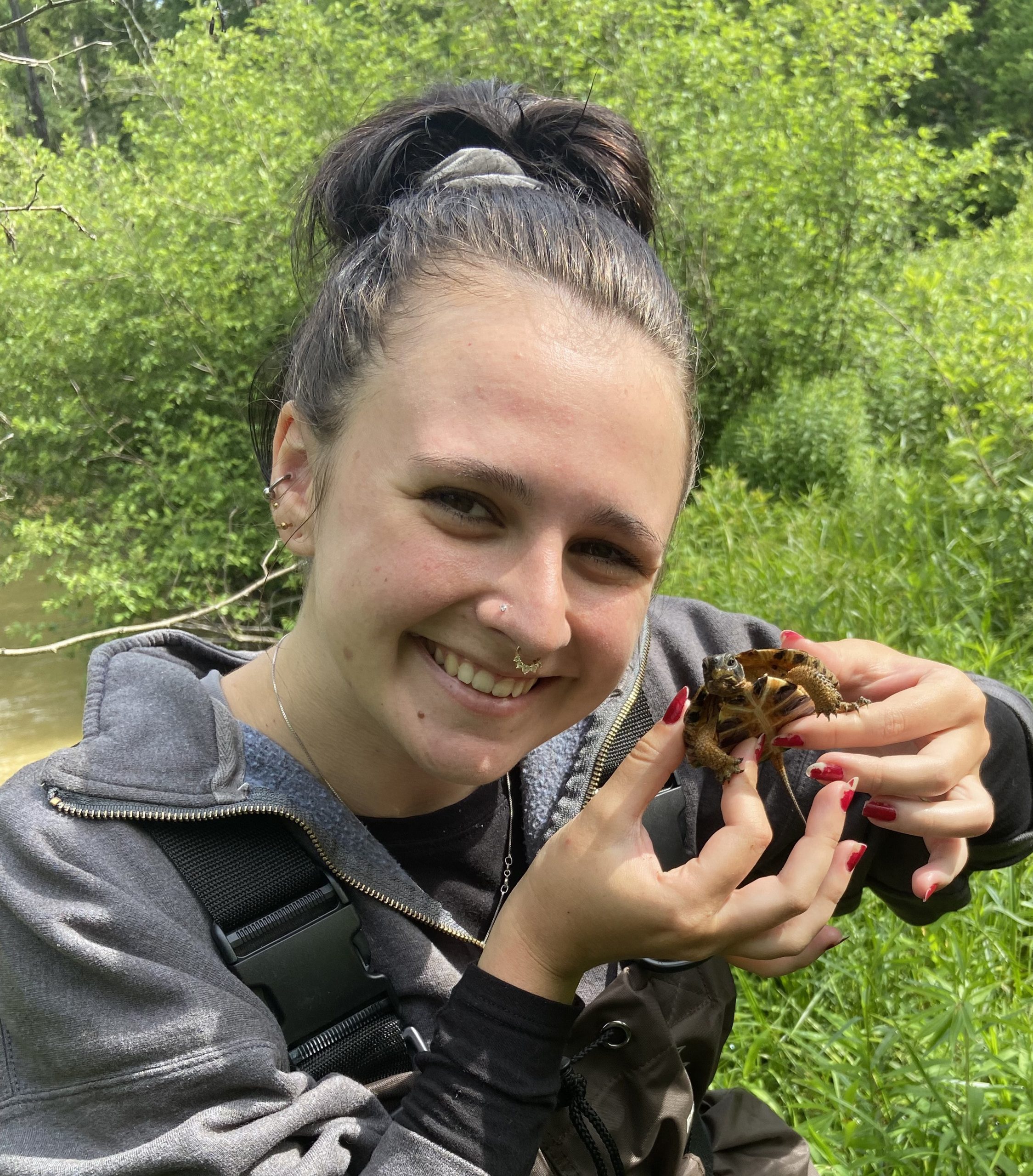 Angie Casella holding a turtle