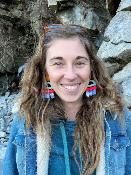 Amanda Gavin smiling in front of rocks
