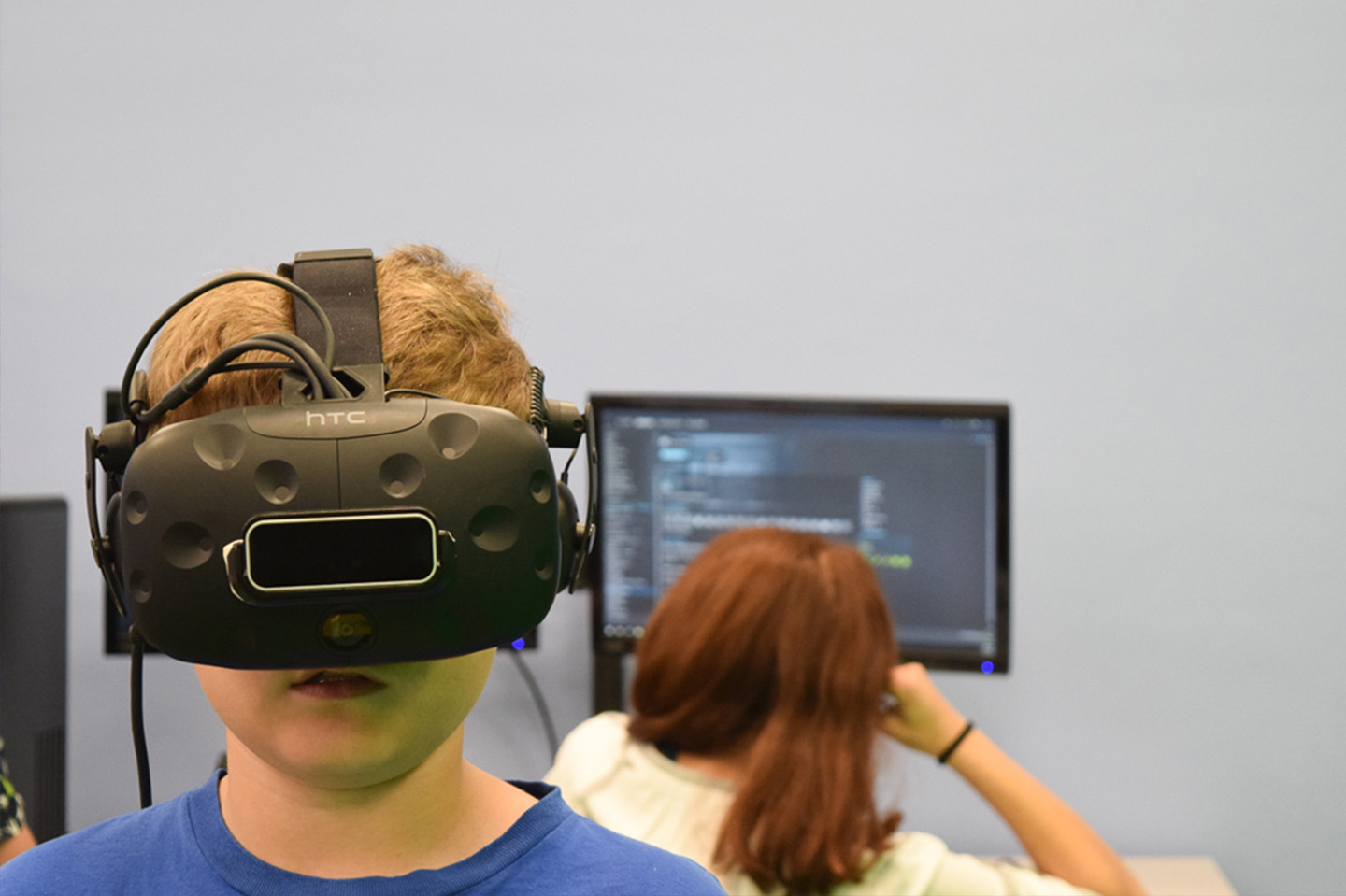 Students using a virtual reality headset 