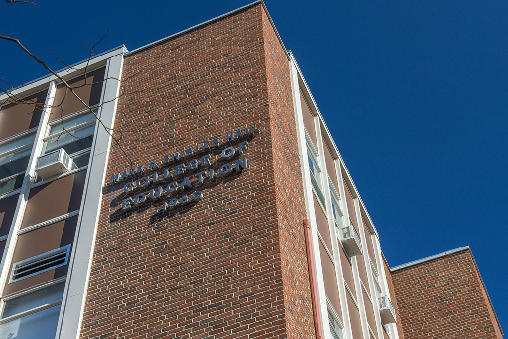 A photo of Shibles Hall displaying the sign reading College of Education