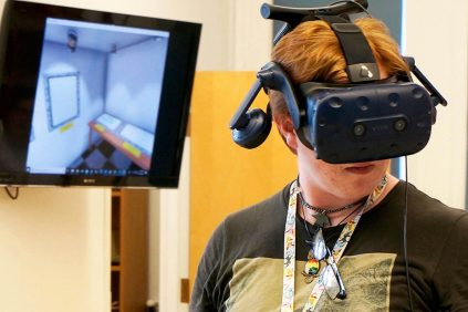A student participates in the 2019 Step Up to College program at the UnA student wearing a virtual reality head set participates in the 2019 Step Up to College program at the University of Maine.iversity of Maine.