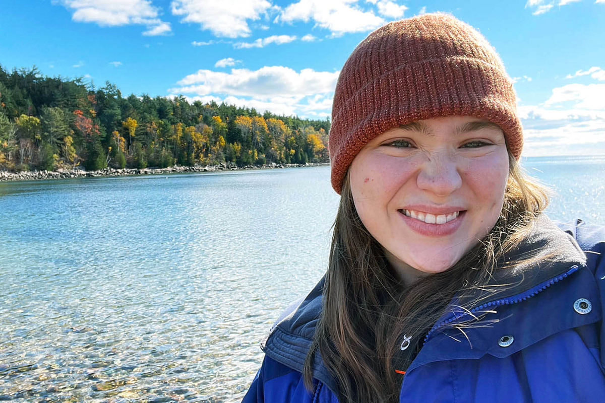 A photo of Katherine McCarthy at a lake in Maine.