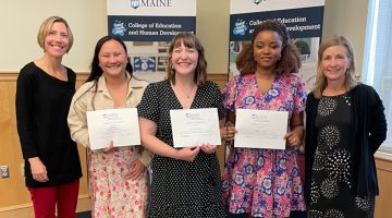 Associate professor of higher education Leah Hakkola, higher education master's students Sabrina Murray, Devin Franklin, and Sophie Audu, and professor of higher education Elizabeth Allan at the 2023 University of Maine College of Education and Human Development Student Awards Ceremony.