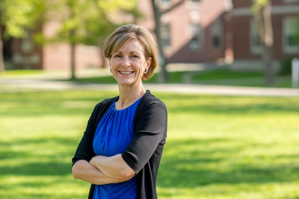 An outdoor portrait of Elizabeth Allan on the University of Maine campus.