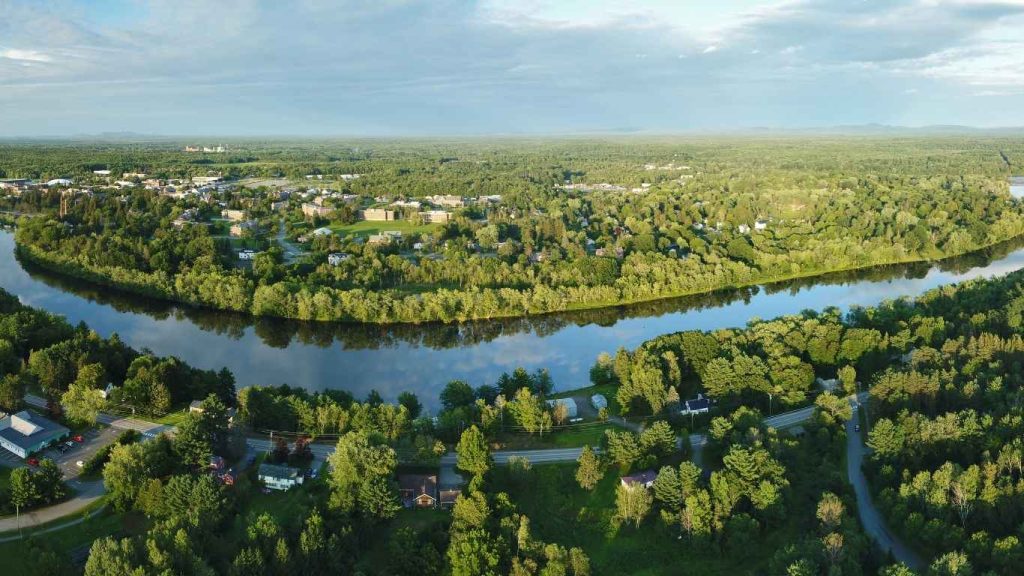 An aerial view of the UMaine campus in Orono with the Stillwater river in the forefront.