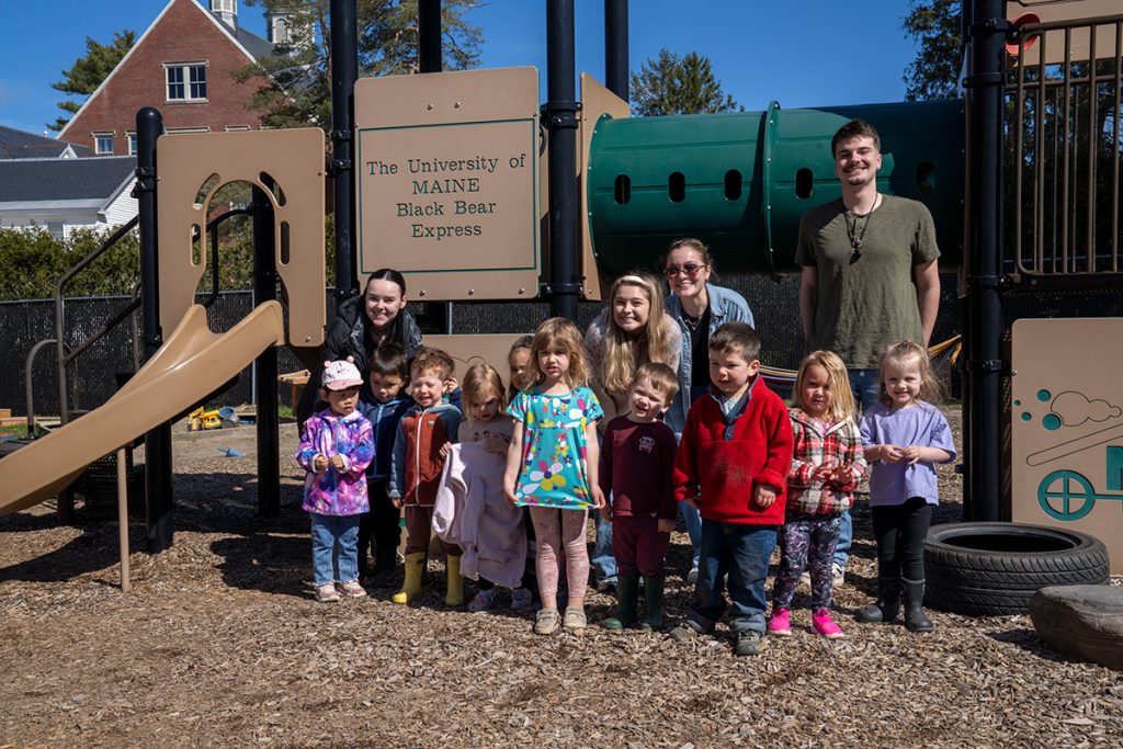 A photo of University of Maine early childhood education students working with preschoolers at the Katherine Miles Durst Child Development Learning Center.