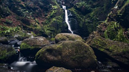 photo of waterfall over rocks