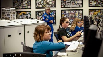 Girls at the Challenger Learning Center working on computers