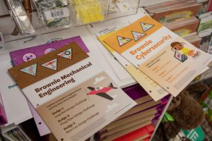 Paper copies of the STEM curriculum developed by the girl scouts