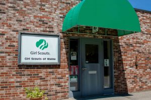 Doorway and sign to the Girl Scouts of Maine building located in Bangor 