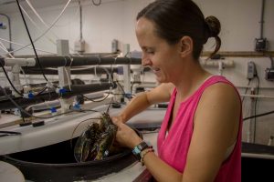 Female graduate student conducting research in the SEANET OA Lab