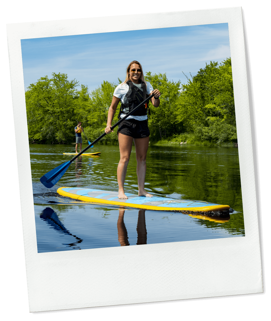 A photo of a person paddleboarding on the Stillwater River