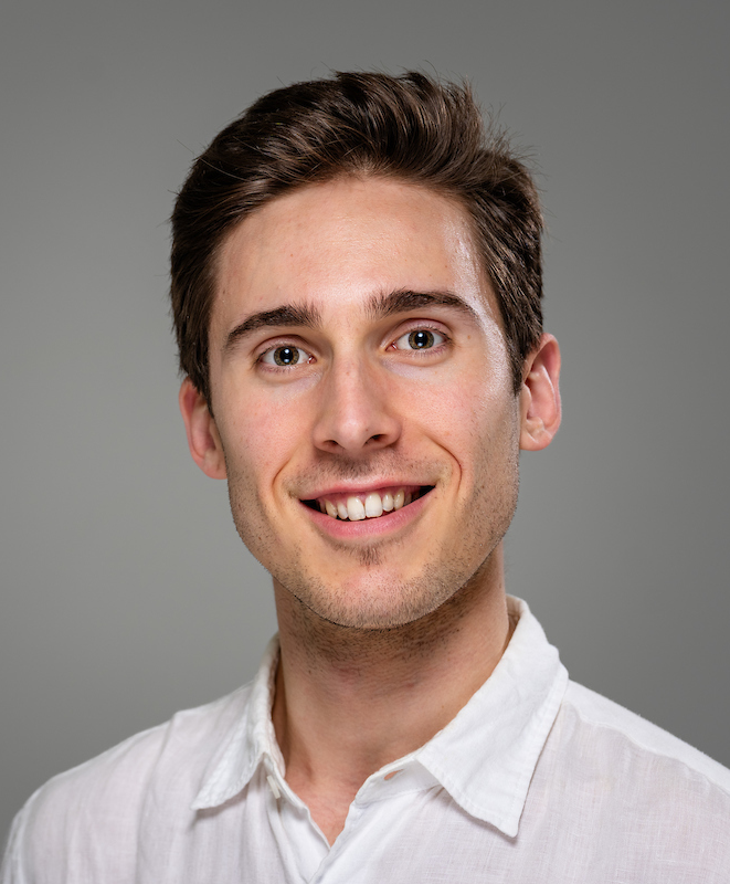 Portrait of William Somes smiling.