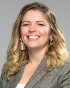 Portrait of Glenda Pereira smiling.